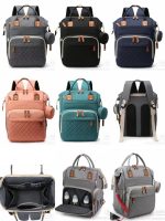 Mochila maternal impermeable con porta-chupetes