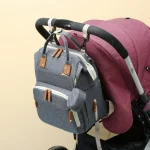 Mochila maternal impermeable con porta-chupetes - Image 4