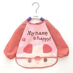 Babero de manga larga con bolsillo